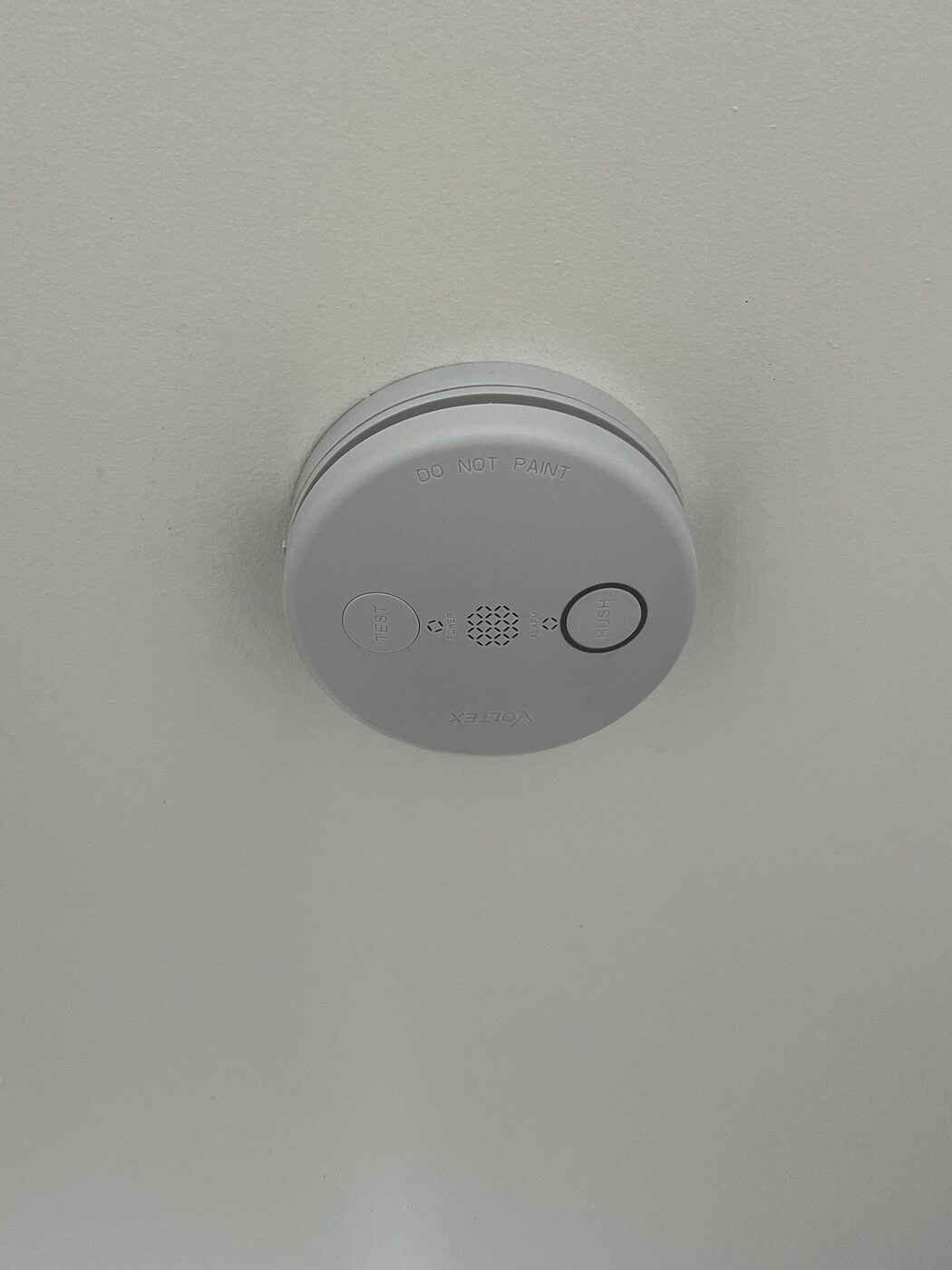 New compliant smoke alarm fitted to the ceiling